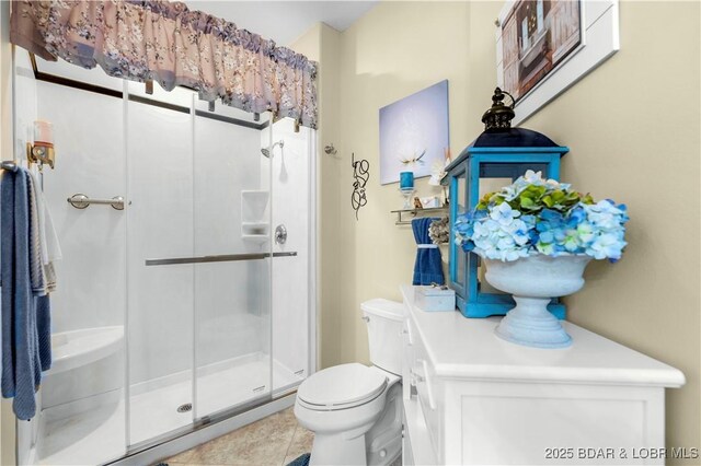 18132 Millstone Cove Rd Unit 334, Gravois Mills, MO 65037 - bathroom with a shower stall and tile patterned flooring