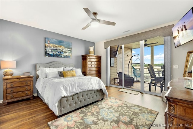18132 Millstone Cove Rd Unit 334, Gravois Mills, MO 65037 - bedroom featuring access to exterior, wood finished floors, and ceiling fan