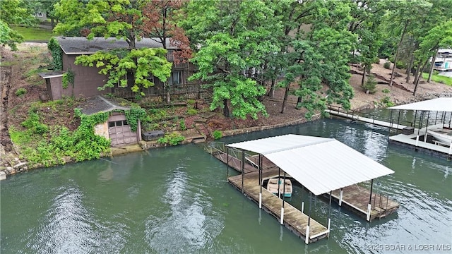 333 Crane Cove Rd, Sunrise Beach, MO 65079 - dock featuring boat lift and a water view