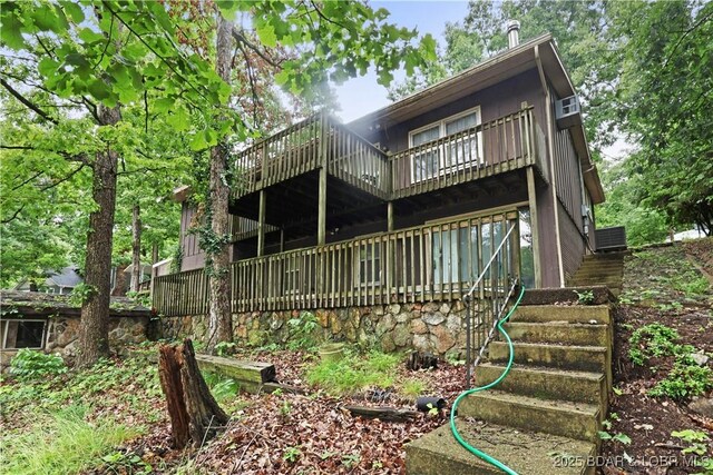 333 Crane Cove Rd, Sunrise Beach, MO 65079 - back of house with stairs and a balcony