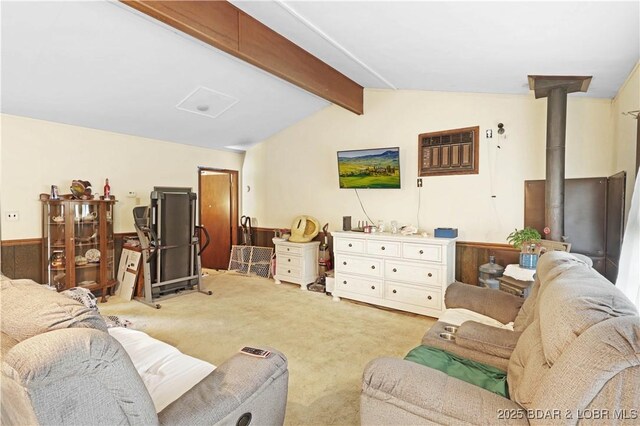 333 Crane Cove Rd, Sunrise Beach, MO 65079 - living area featuring carpet, an AC wall unit, and a wood stove