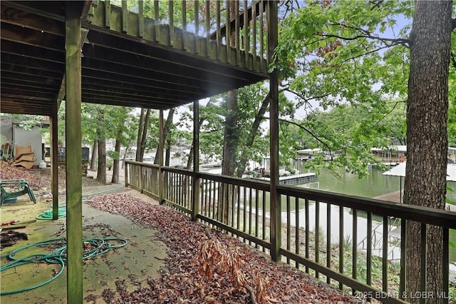 333 Crane Cove Rd, Sunrise Beach, MO 65079 - wooden terrace featuring a water view and a dock