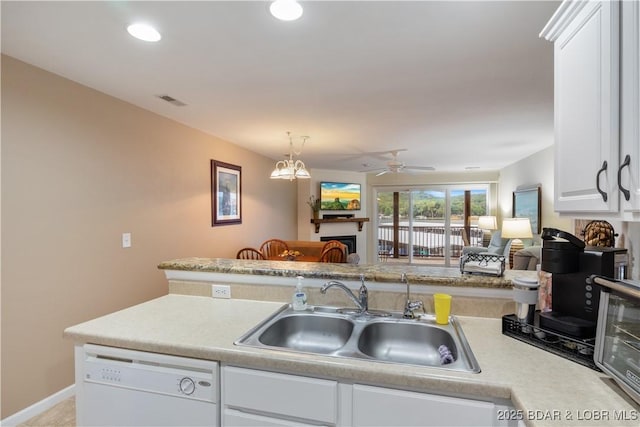686 Clearwater Dr Unit 2C, Camdenton, MO 65020 - kitchen featuring dishwasher, a ceiling fan, light countertops, white cabinetry, and recessed lighting