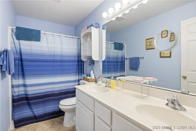686 Clearwater Dr Unit 2C, Camdenton, MO 65020 - bathroom featuring double vanity and tile patterned floors