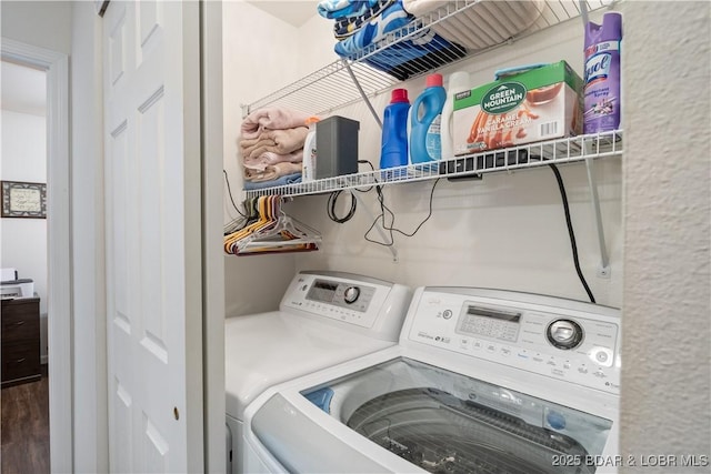 686 Clearwater Dr Unit 2C, Camdenton, MO 65020 - laundry room featuring washer and clothes dryer and wood finished floors