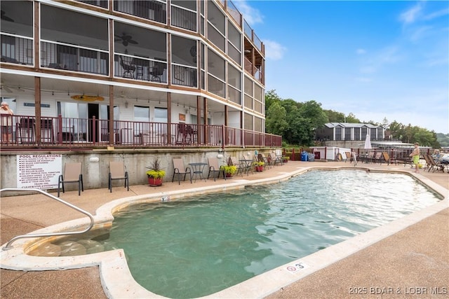 686 Clearwater Dr Unit 2C, Camdenton, MO 65020 - community pool with a patio area and a ceiling fan
