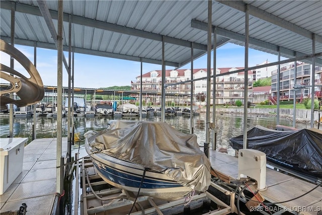 686 Clearwater Dr Unit 2C, Camdenton, MO 65020 - dock area featuring boat lift and a water view