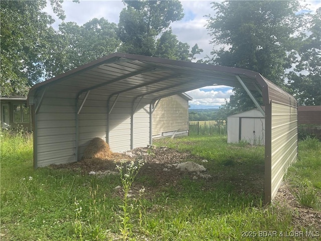 4712 Camden Line Rd, Lebanon, MO 65536 - view of parking featuring a storage shed and a carport