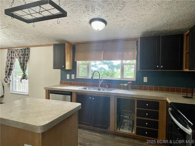 4712 Camden Line Rd, Lebanon, MO 65536 - kitchen featuring dishwasher, dark wood finished floors, range with electric stovetop, light countertops, and a textured ceiling