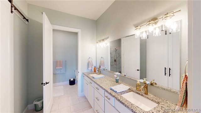 1065 Topsider Ln Unit 505, Osage Beach, MO 65065 - bathroom featuring double vanity and a tile shower