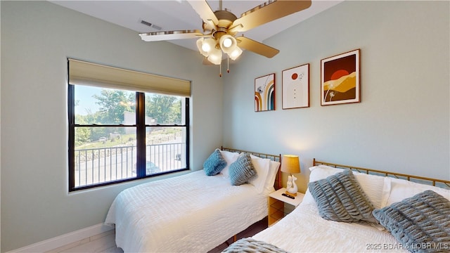 1065 Topsider Ln Unit 505, Osage Beach, MO 65065 - bedroom with baseboards and a ceiling fan