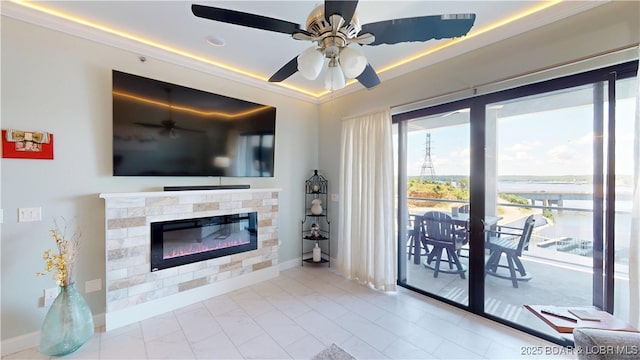 1065 Topsider Ln Unit 505, Osage Beach, MO 65065 - living area with a glass covered fireplace and a ceiling fan
