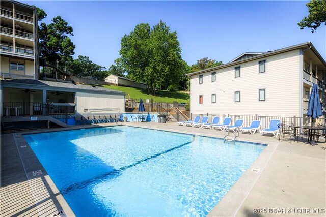 23 Willow Ridge Pt Unit 2B, Lake Ozark, MO 65049 - community pool featuring a ceiling fan and a patio area