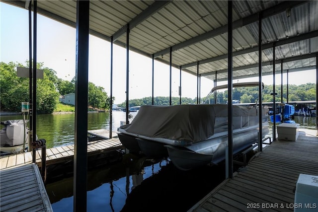 23 Willow Ridge Pt Unit 2B, Lake Ozark, MO 65049 - dock area featuring a water view and boat lift