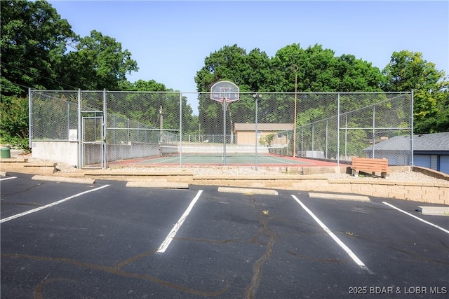 23 Willow Ridge Pt Unit 2B, Lake Ozark, MO 65049 - uncovered parking lot with community basketball court