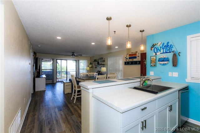 23 Willow Ridge Pt Unit 2B, Lake Ozark, MO 65049 - kitchen with ceiling fan, dark wood-style floors, recessed lighting, hanging light fixtures, and dishwasher