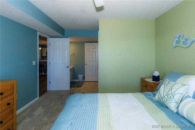 23 Willow Ridge Pt Unit 2B, Lake Ozark, MO 65049 - carpeted bedroom featuring a textured ceiling and a ceiling fan