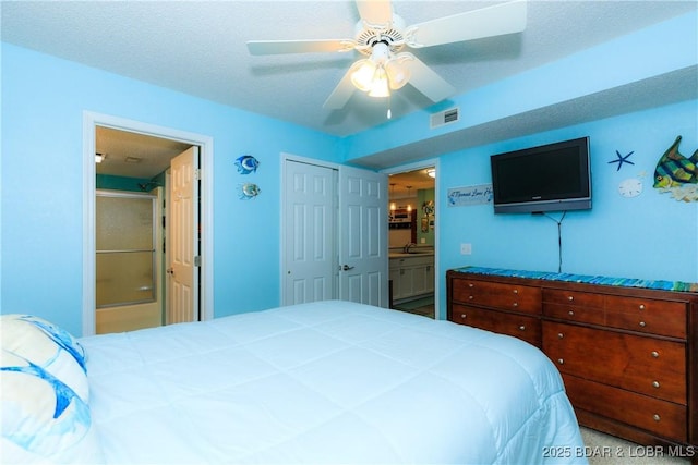 23 Willow Ridge Pt Unit 2B, Lake Ozark, MO 65049 - bedroom featuring ensuite bath and a ceiling fan