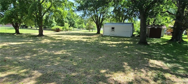 508 Hunter St N, Versailles, MO 65084 - view of yard with a storage unit
