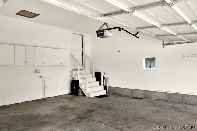 712 Passover Rd, Osage Beach, MO 65065 - garage with a garage door opener