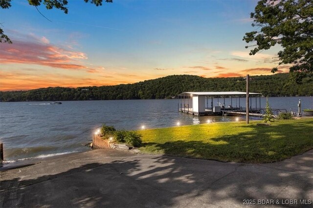 948 Cable Point Dr, Climax Springs, MO 65324 - dock area featuring a forest view and a water view