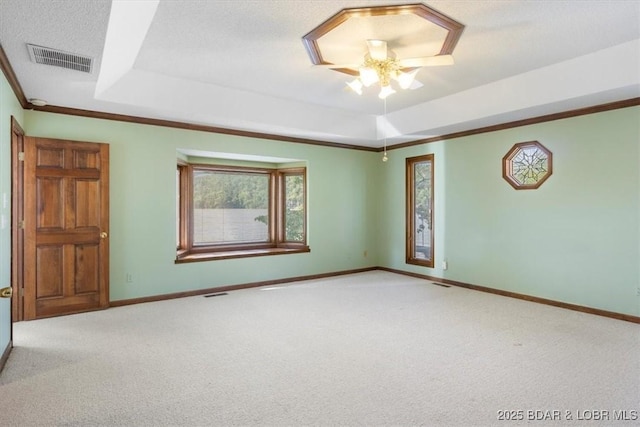 948 Cable Point Dr, Climax Springs, MO 65324 - carpeted empty room with a tray ceiling, ceiling fan, and ornamental molding