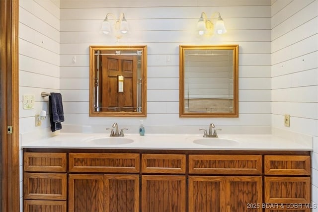 948 Cable Point Dr, Climax Springs, MO 65324 - bathroom featuring double vanity and wooden walls