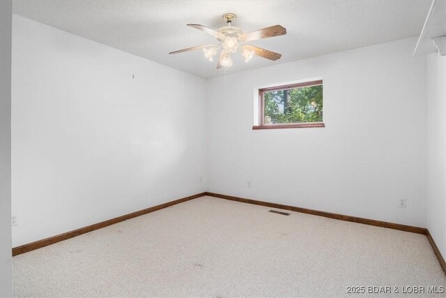 948 Cable Point Dr, Climax Springs, MO 65324 - carpeted spare room with a ceiling fan and baseboards