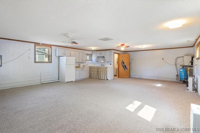 948 Cable Point Dr, Climax Springs, MO 65324 - garage featuring freestanding refrigerator and a ceiling fan