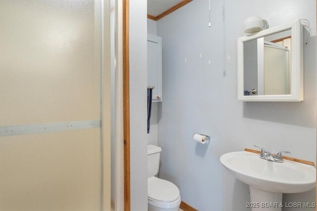 948 Cable Point Dr, Climax Springs, MO 65324 - bathroom with ornamental molding and a shower with door