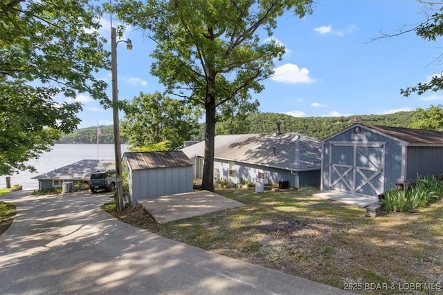 948 Cable Point Dr, Climax Springs, MO 65324 - view of front of house featuring a storage shed