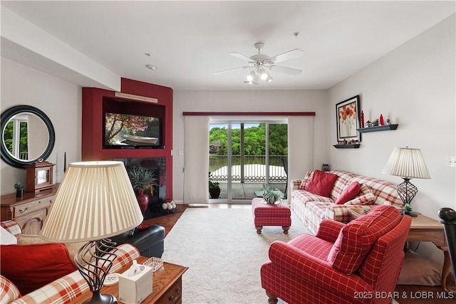 562 Hyd A Way Rd Unit 3F, Camdenton, MO 65020 - carpeted living area with a ceiling fan