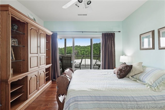 562 Hyd A Way Rd Unit 3F, Camdenton, MO 65020 - bedroom with access to outside and dark wood finished floors
