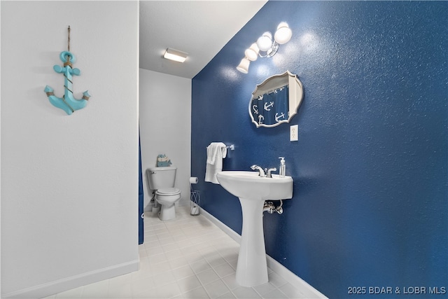 6504 Avalon Park, Osage Beach, MO 65065 - bathroom featuring toilet and tile patterned flooring