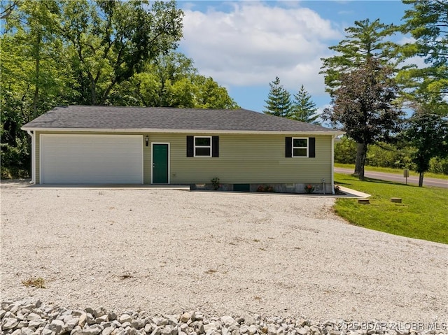 326 State Rd W, Macks Creek, MO 65786 - view of front of property with driveway and a garage