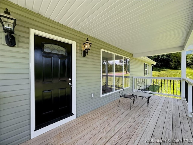326 State Rd W, Macks Creek, MO 65786 - view of wooden porch