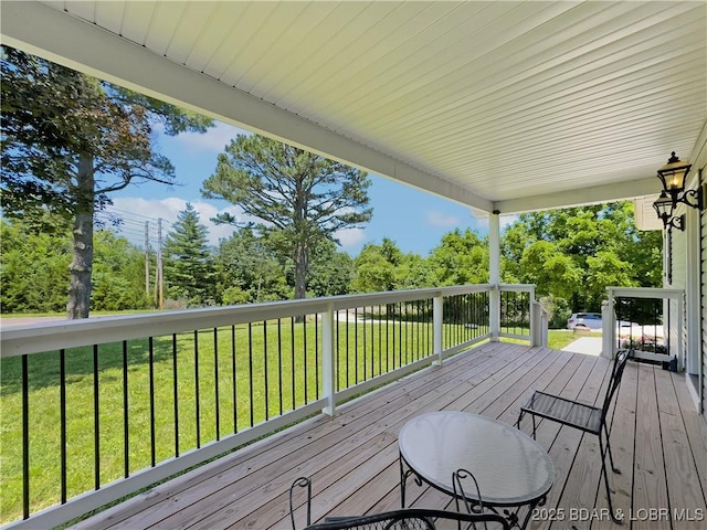 326 State Rd W, Macks Creek, MO 65786 - wooden terrace with a yard and view of scattered trees