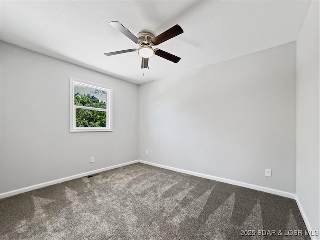 326 State Rd W, Macks Creek, MO 65786 - unfurnished room with dark colored carpet and ceiling fan