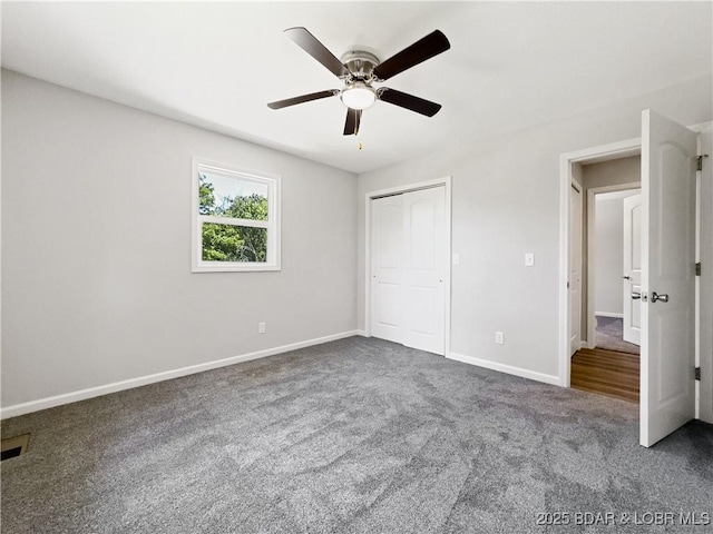326 State Rd W, Macks Creek, MO 65786 - unfurnished bedroom featuring carpet floors, ceiling fan, and a closet