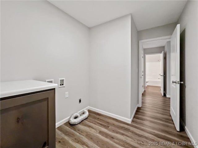 326 State Rd W, Macks Creek, MO 65786 - washroom featuring hookup for a washing machine, light wood-style flooring, and electric dryer hookup