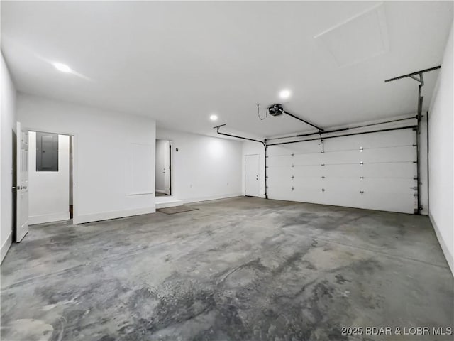 326 State Rd W, Macks Creek, MO 65786 - garage featuring a garage door opener and recessed lighting
