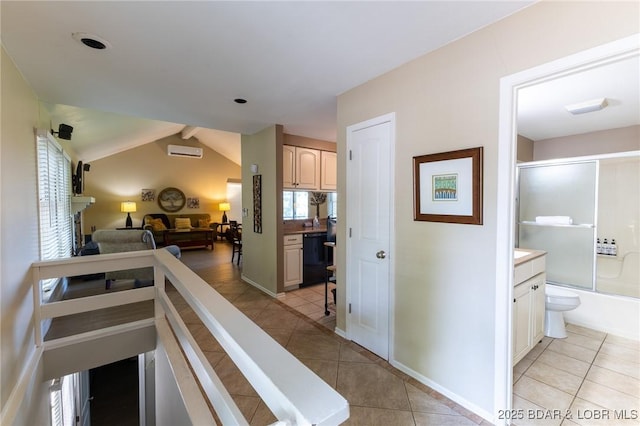415 Staniel Cay Dr, Osage Beach, MO 65065 - corridor featuring light tile patterned floors and a wall mounted air conditioner