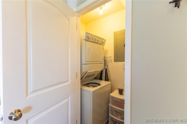 415 Staniel Cay Dr, Osage Beach, MO 65065 - laundry area with stacked washer / dryer and electric panel