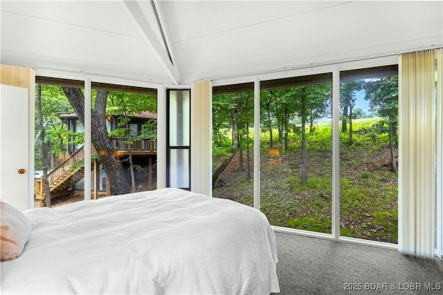 146 Tree Top Dr Unit 8, Four Seasons, MO 65049 - bedroom featuring beam ceiling and carpet flooring