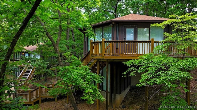 146 Tree Top Dr Unit 8, Four Seasons, MO 65049 - rear view of property featuring stairs and a deck