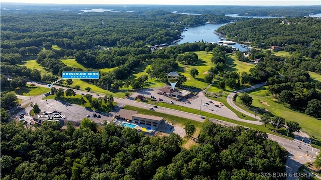 146 Tree Top Dr Unit 8, Four Seasons, MO 65049 - view of property location featuring a nearby body of water and a forest
