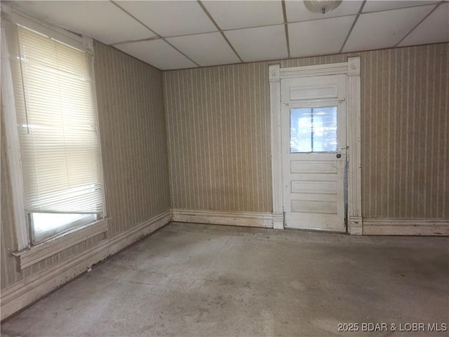 412 Maple St, Eldon, MO 65026 - unfurnished room featuring concrete flooring and a drop ceiling