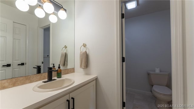 2268 Breezy Acres Rd, Osage Beach, MO 65065 - bathroom featuring vanity and toilet