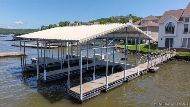 2268 Breezy Acres Rd, Osage Beach, MO 65065 - dock featuring boat lift and a water view