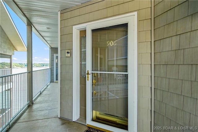 68 Lighthouse Rd Unit 906, Lake Ozark, MO 65049 - view of exterior entry featuring a balcony